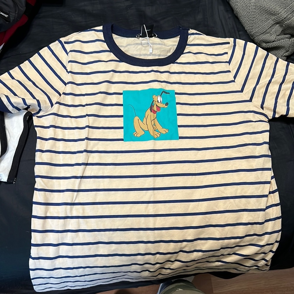 Disney Zara Pluto shirt never been worn but did rip off the tag.